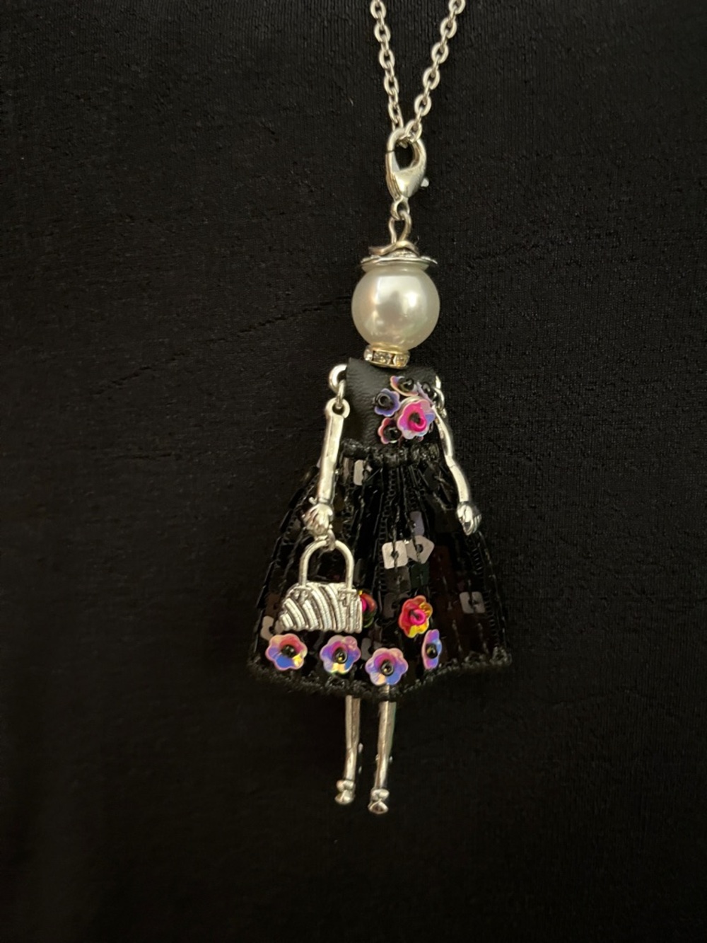 Coco + Carmen Black Doll Pendant Necklace with Pink & Purple Flower Accents - Picture 3 of 9